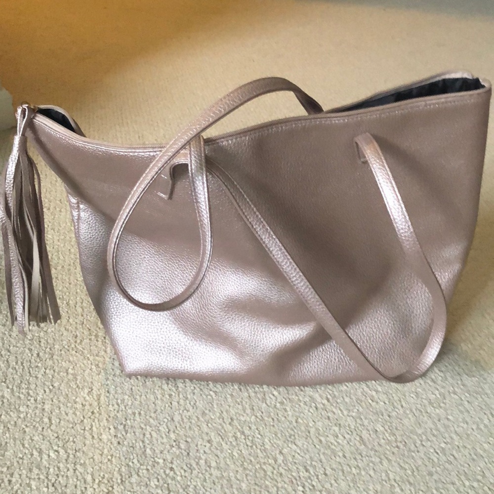 Rose gold shimmer tote with tassel never used